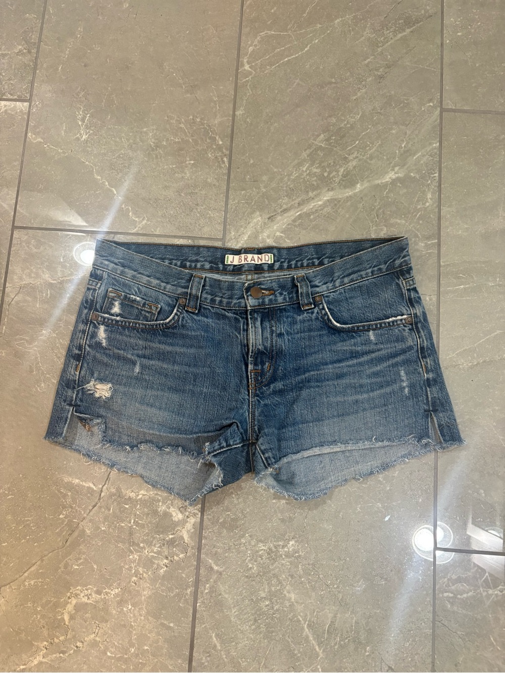 J Brand Distressed Blue Denim Cutoff Shorts